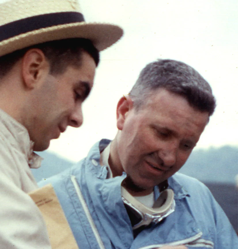 WALT HANSGEN: Hansgen looks over a photo with BARC founder Dave Nicholas in 1959.