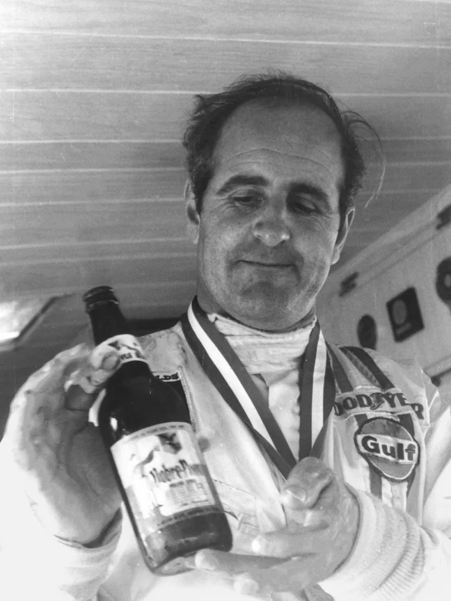 DENNY HULME: Hulme after the Glen Can Am 1969 ready to taste a beer in Spankey Smith’s motor home. Hulme spent hours in the BARC motorhome along with all the F1 and CanAm greats.