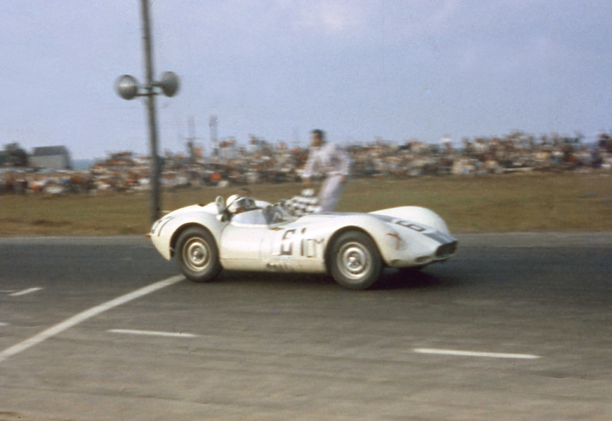 Crawfords Lister-Jag wins the Grand Prix on the same day his boss, Briggs Cunningham clinches the America’s Cup yacht races. A great weekend for Briggs.