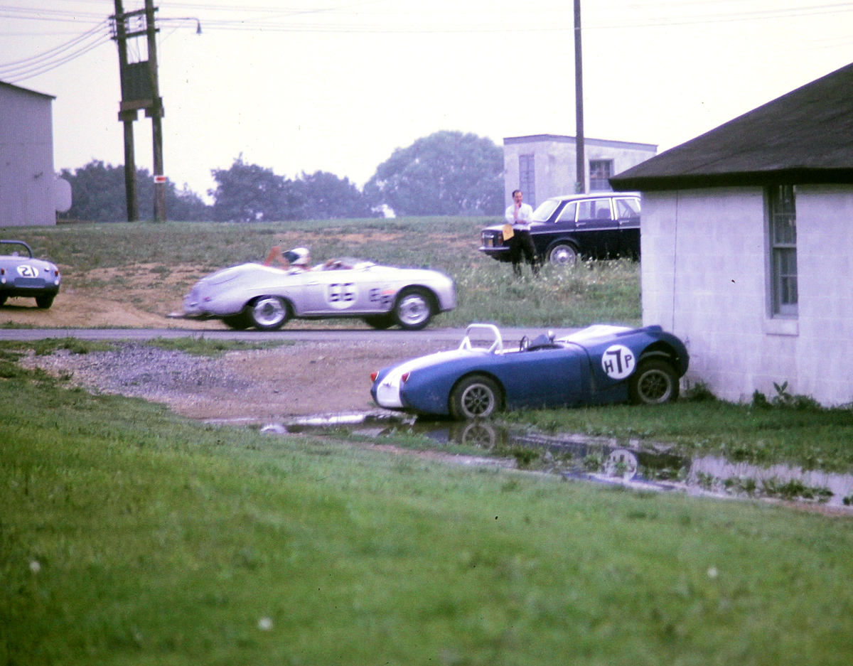 A few wounded Sprites, Dick Colver’s #21 sits abandoned and Dan Miller’s #7 looks a bit bent. Jack Rabold drives his Porsche on the cool down lap.