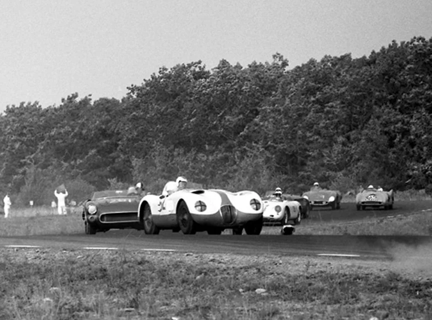 Gordon McKenzie's C Jag leads the last part of the field ahead of the SR-2 Corvette with Bucher's Mondial Ferrari & Bob Kahmers Lotus-Bristol coming up.