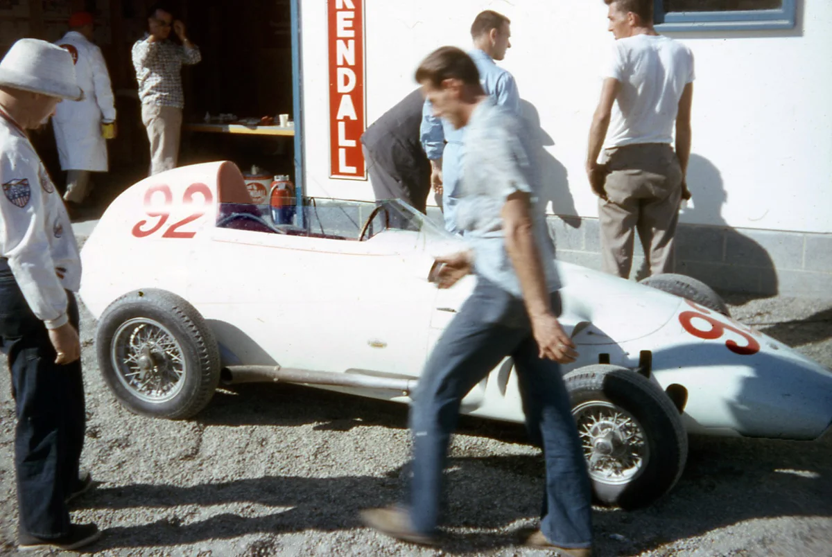 Sandy Mac Arthur’s new and unusual Stanguellini Formula Junior. The person on the left is simply gawking at the car. Juniors were first sanctioned in October 1958 as an inexpensive training ground for young drivers.