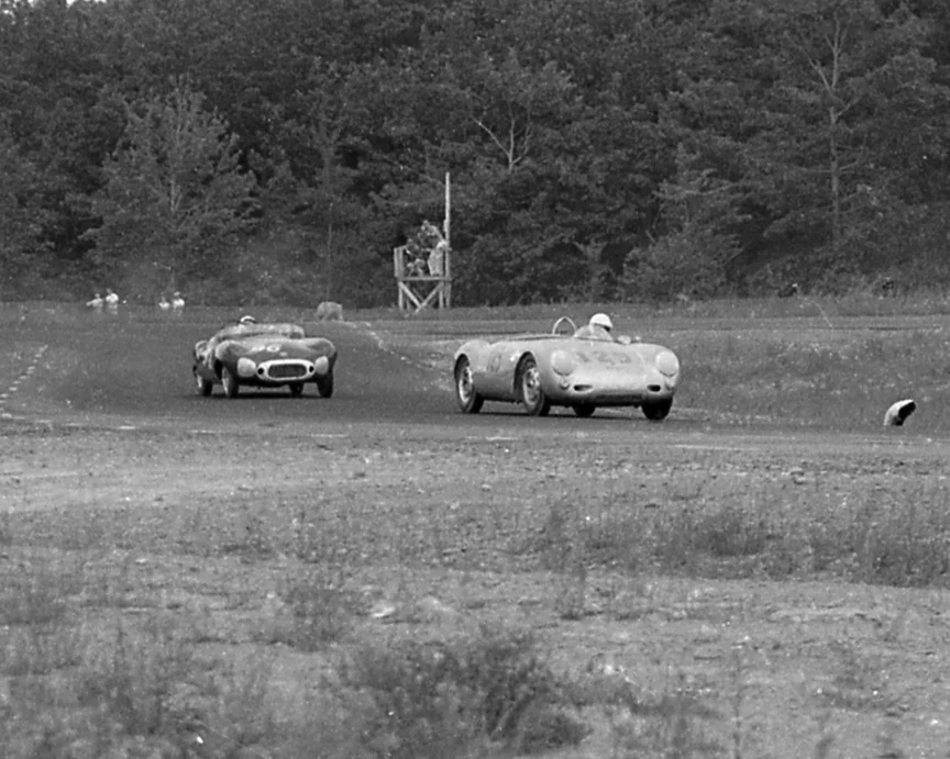 Manfred Holder’s Porsche 550 leads Chuck Dietrich’s Elva Mk II. Dietrich would come 4th and Holder would fade to 6th