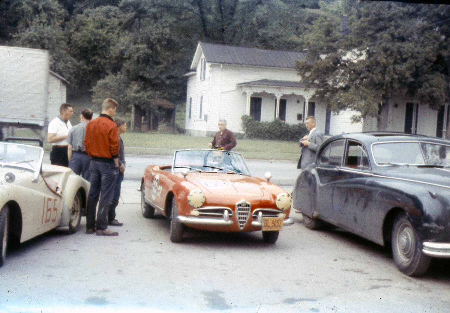 The # 69 Alfa of Ed Sheeder sits next to the TR-3 of Dave Adams. In the mid 60’s Adams would be a winner in his Triumph TR-2.