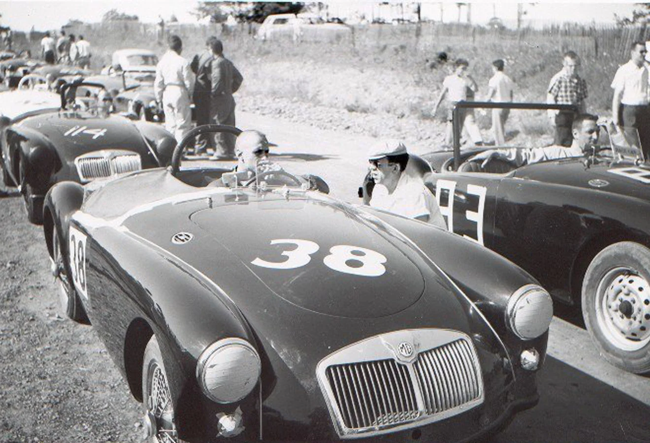Sherm Decker with his usual cigarette waiting to head out. George Valentine is behind him and Jack Terhaar alongside. Decker won, Valentine was 2nd and Terhaar 4th.