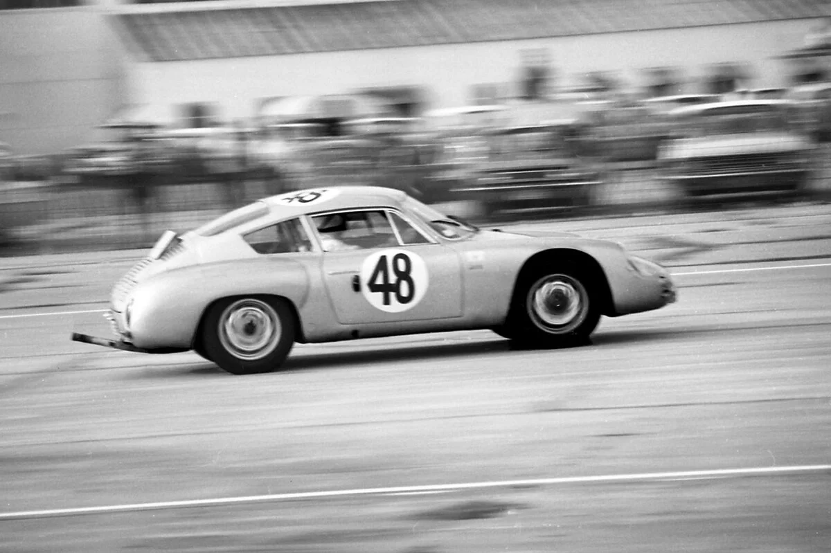 Bob Holbert would team with Dan Gurney is the Abarth-Porsche to finish 7th overall and first in the 1.6class.