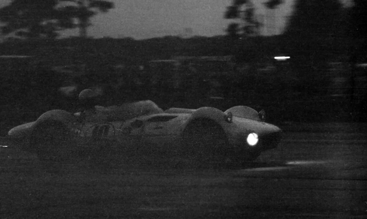 We were experimenting taking photos at night. The best part is the flag marshals never saw us as we climbed the fences and got close to take this photo of the #10 Chaparral.