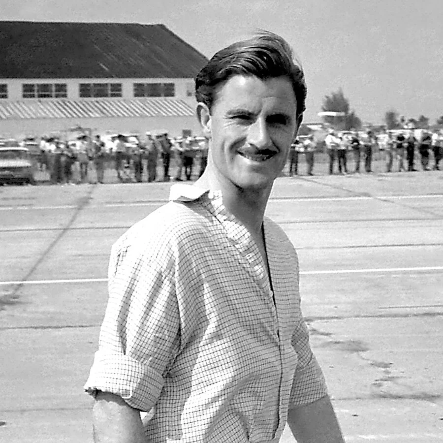 Newly inducted BARC member, Graham Hill smiles for the camera.