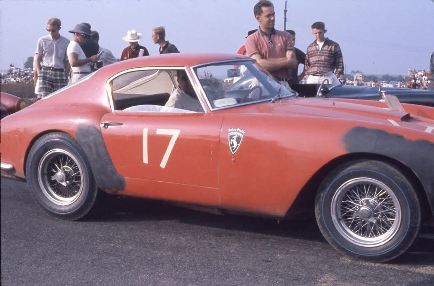 Dean McCarthy sits in his repaired Berlinetta showing off its Jake’s Stable patch. The berlinetta had to run in D Modified as Ferrari had not made enough of the cars by 1960 to homologate them. McCarthy ran well to 7th overall and first in D Modified.