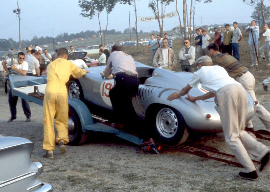 A crew pushes Bill Wuesthoff’s Porsche onto its single axle trailer. As with the Meister Brauser truck, this was the most common way of transporting cars back in the day. Wuesthoff had a great race finishing 4th overall.