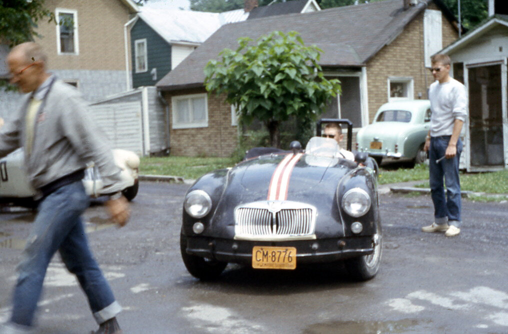 J Sheldon brings his slightly smashed MGA into tech. While there is no number we have another photo of the car later in the day.