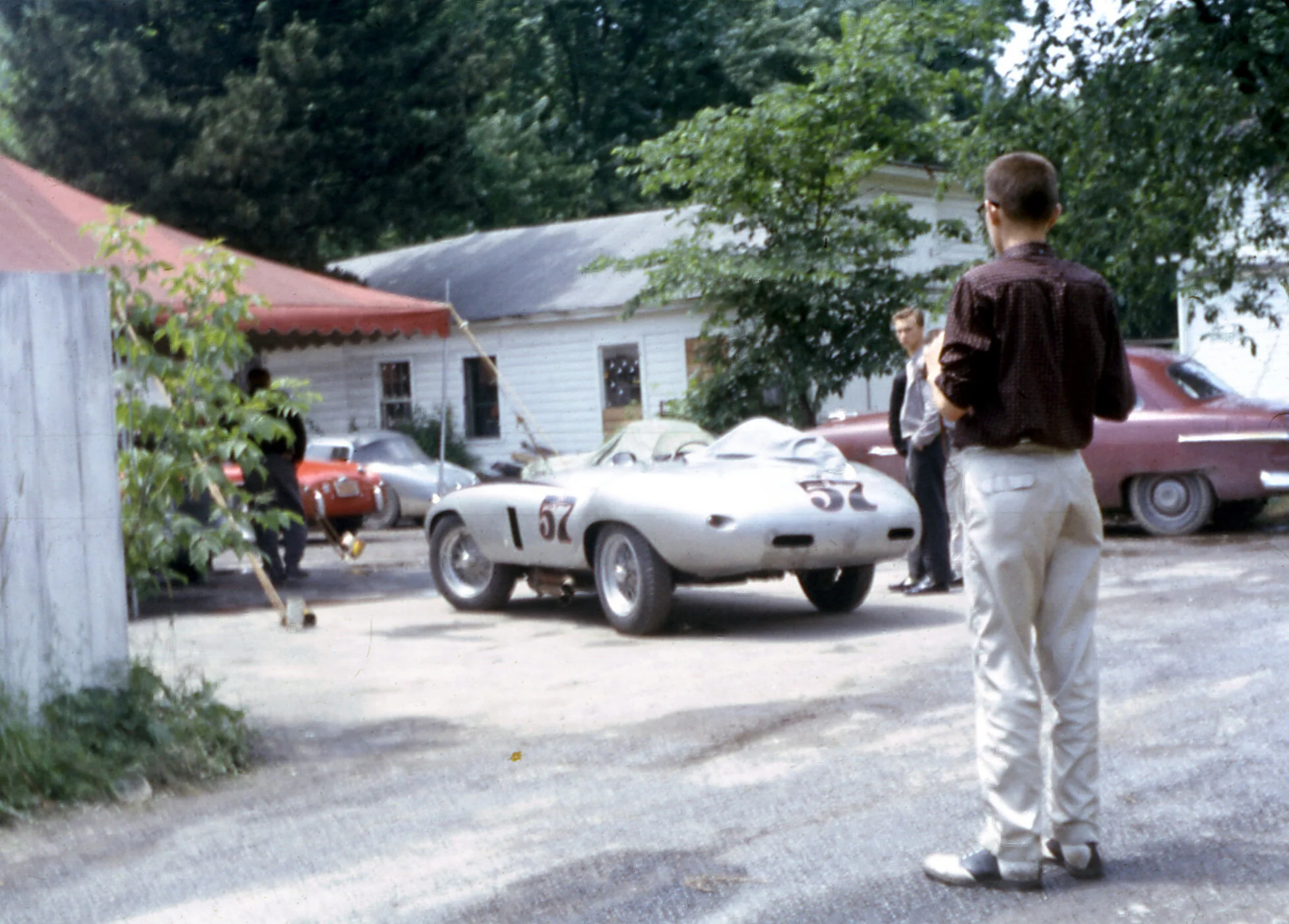 Joe Tierno stares longingly at the Ferrari 500 Mondial that would be driven by Don Peters. The car was owned by Jack Brewer who also drove from time to time. Later in 1959 Bob Bucher drove the car in the Grand Prix. Peters was a dnf.