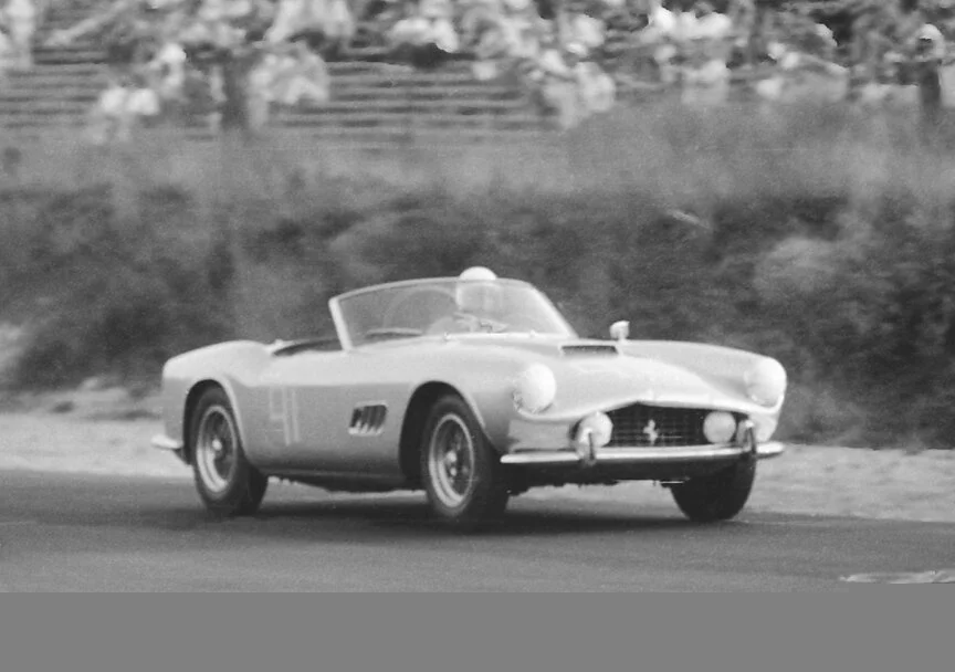 Bob Grossman in a Ferrari California had to race in DM as the car, although street legal and driven to the race, was not homologated and could not race in production.