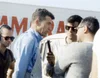  CARROLL SHELBY:  At Sebring in 1958.  Yes Carroll Shelby did race wearing farmers coveralls. 