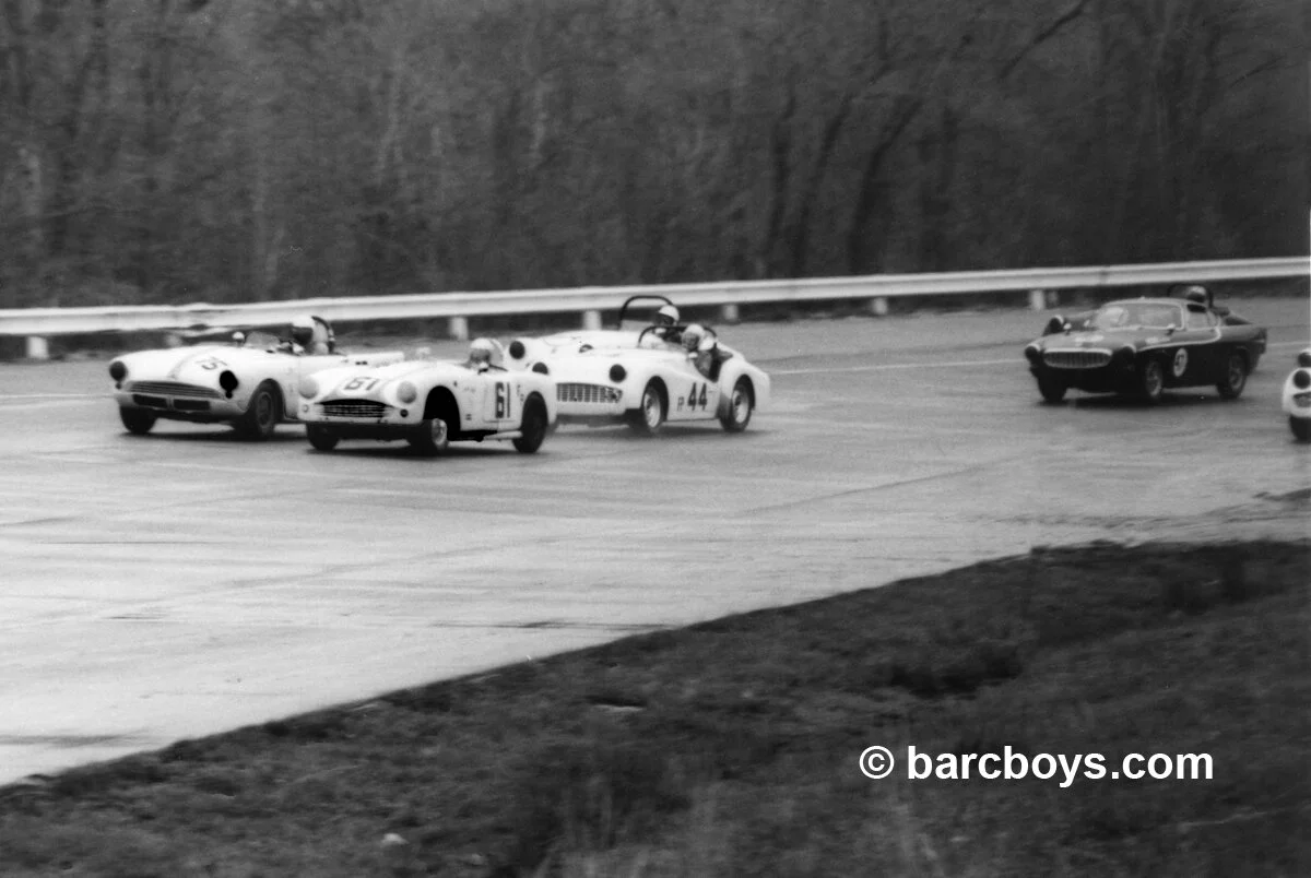  The tight start of the wet FP race.  Ferril Shorty Miller’s Turner has a slight lead on eventual winner Al Costner’s Sunbeam Alpine.  Brian Furstenau in third and Picard’s Volvo P-1800 in 5th. 