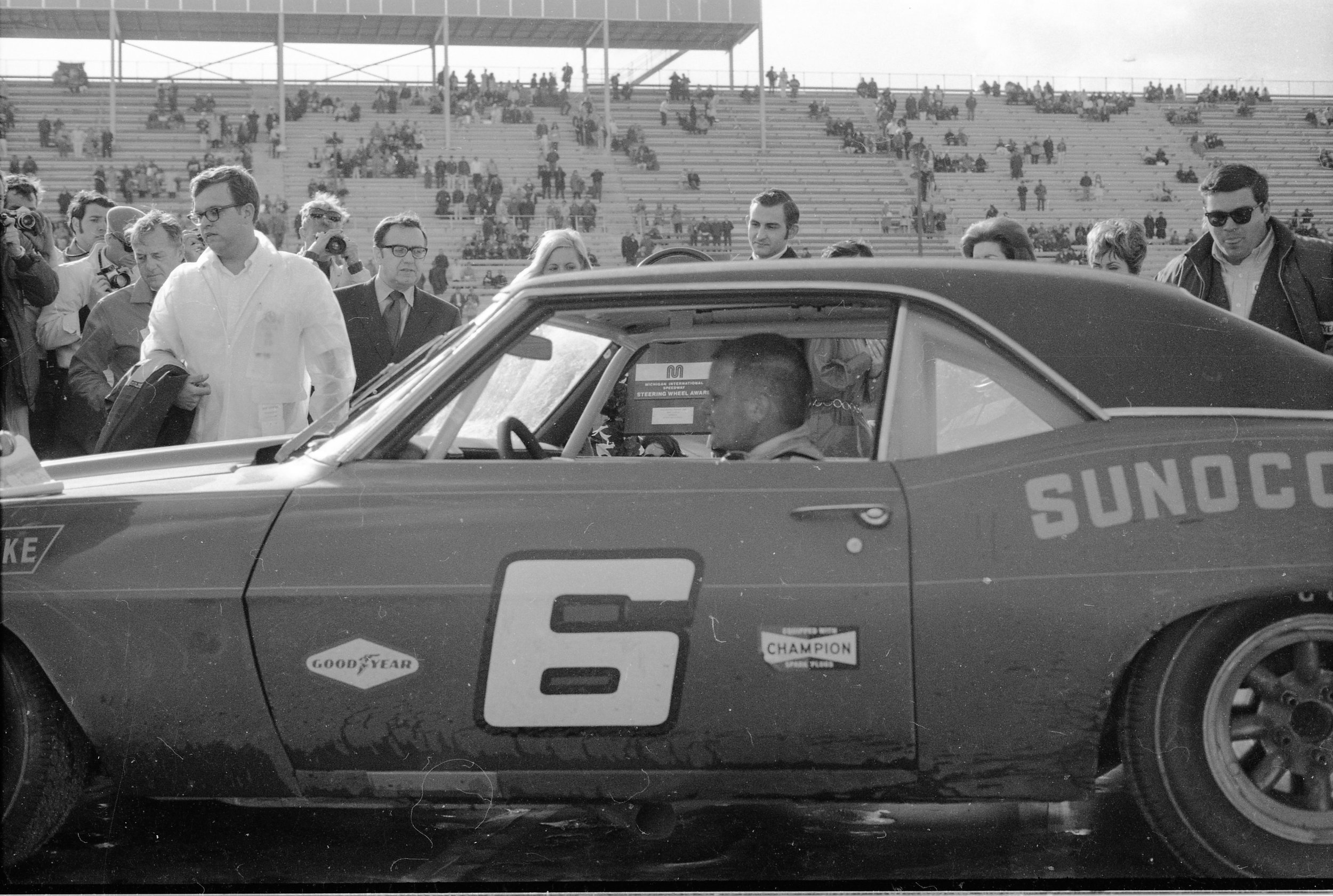  Mark Donohue drives his wet and mud spattered Camaro back to the paddock after a long day to finish 2nd. 