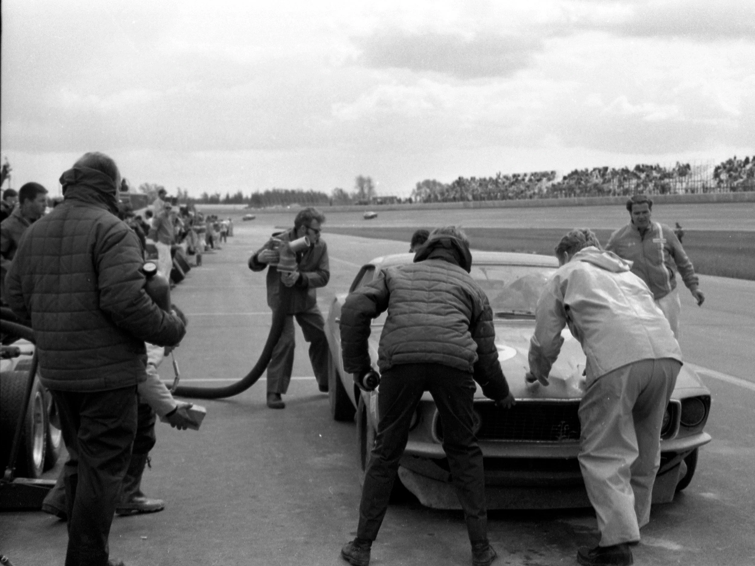  A Mustang crew is ready to refuel and check under the hood.  This is one of Shelby’s cars, but we can’t see the number.  Neither Shelby car finished. 