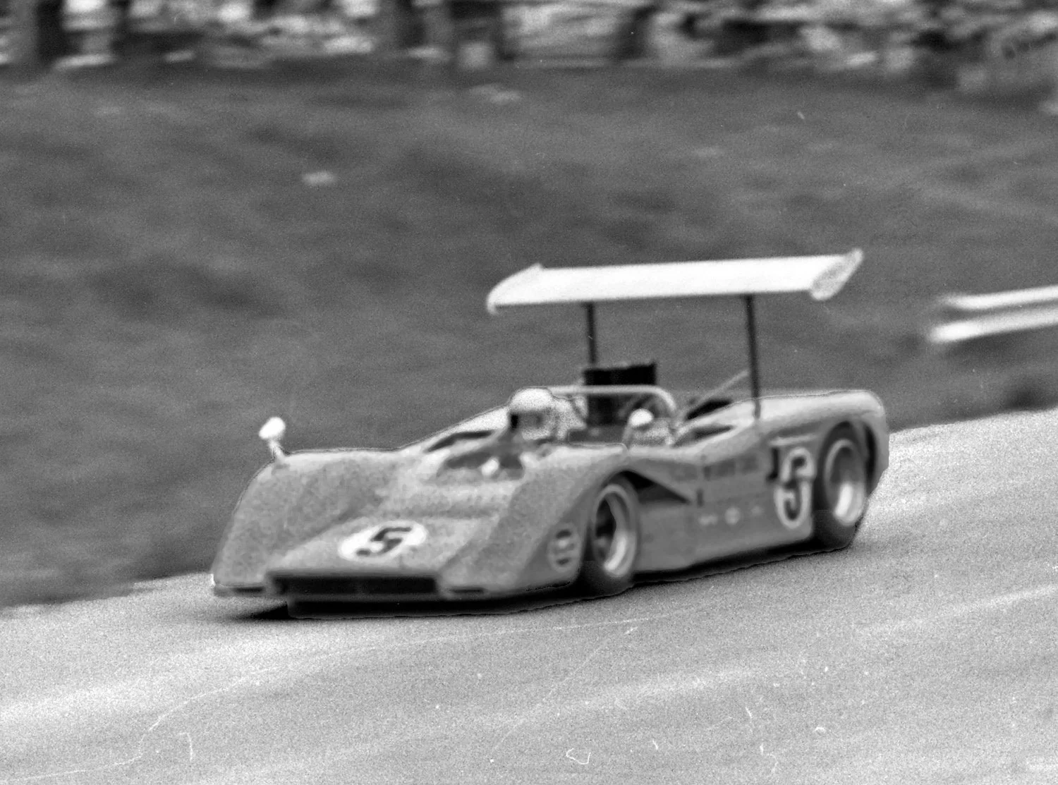 The winner Denny Hulme in his Team McLaren Mk 8B. When you speak of domination - 1969 was all Team McLaren as the Bruce & Denny show won every race.