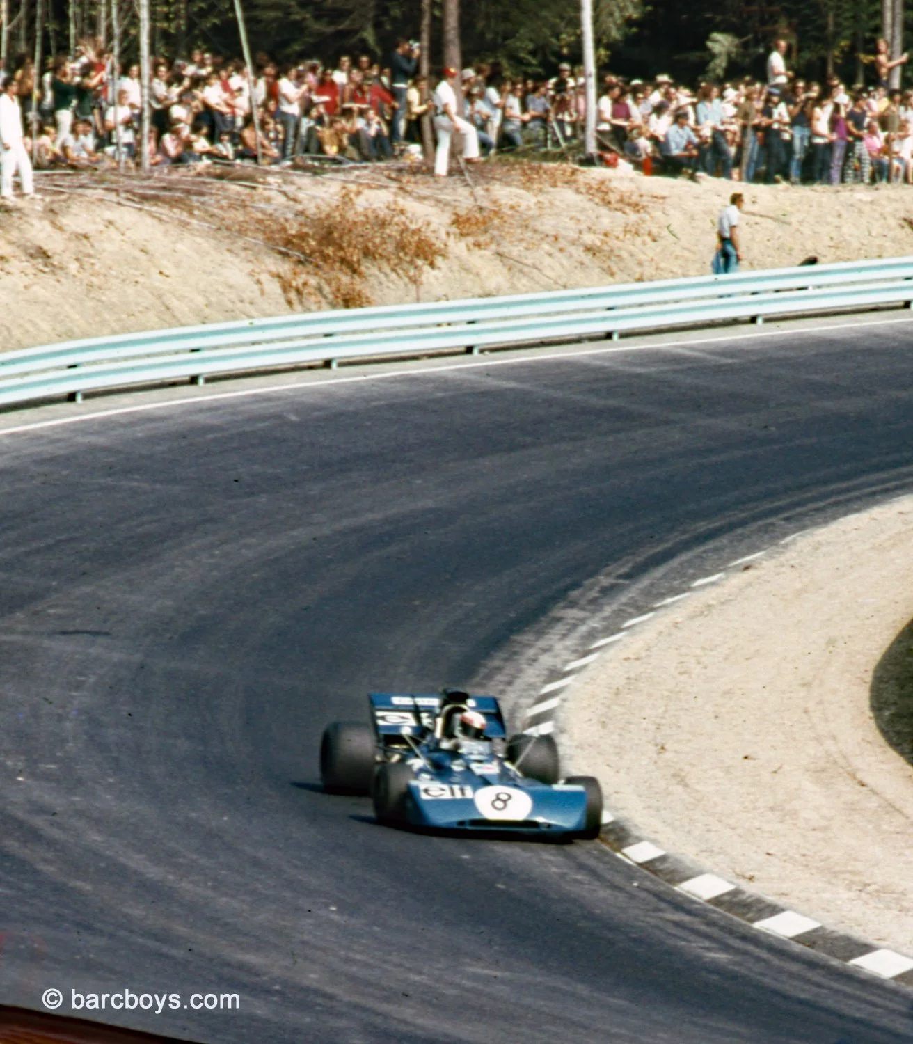 The great Jackie Stewart.  Sir Jackie led but had brake problems and faded to 5th.  Note the huge spectators at the fence.  Today there are better areas and nobody stands there. 