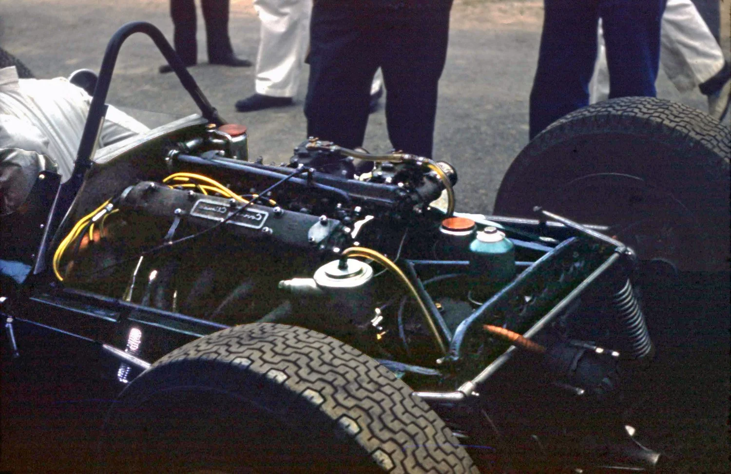  A rather dark image of the back end of the 4 cylinder 1.5 liter Coventry climax engine.  In 1961 only Moss could push this older motor ahead of the vaunted V6 Ferrari’s. 