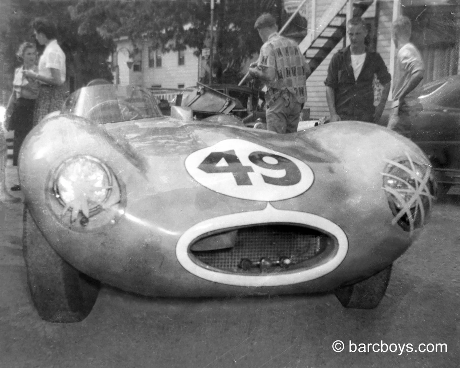 The winning D Type Jag driven by George Constantine. I’ve seen a retouched color shot of the car being light blue. I was there and remember it as being a kind of mustard light yellow. Does anyone have a color photo of that car?