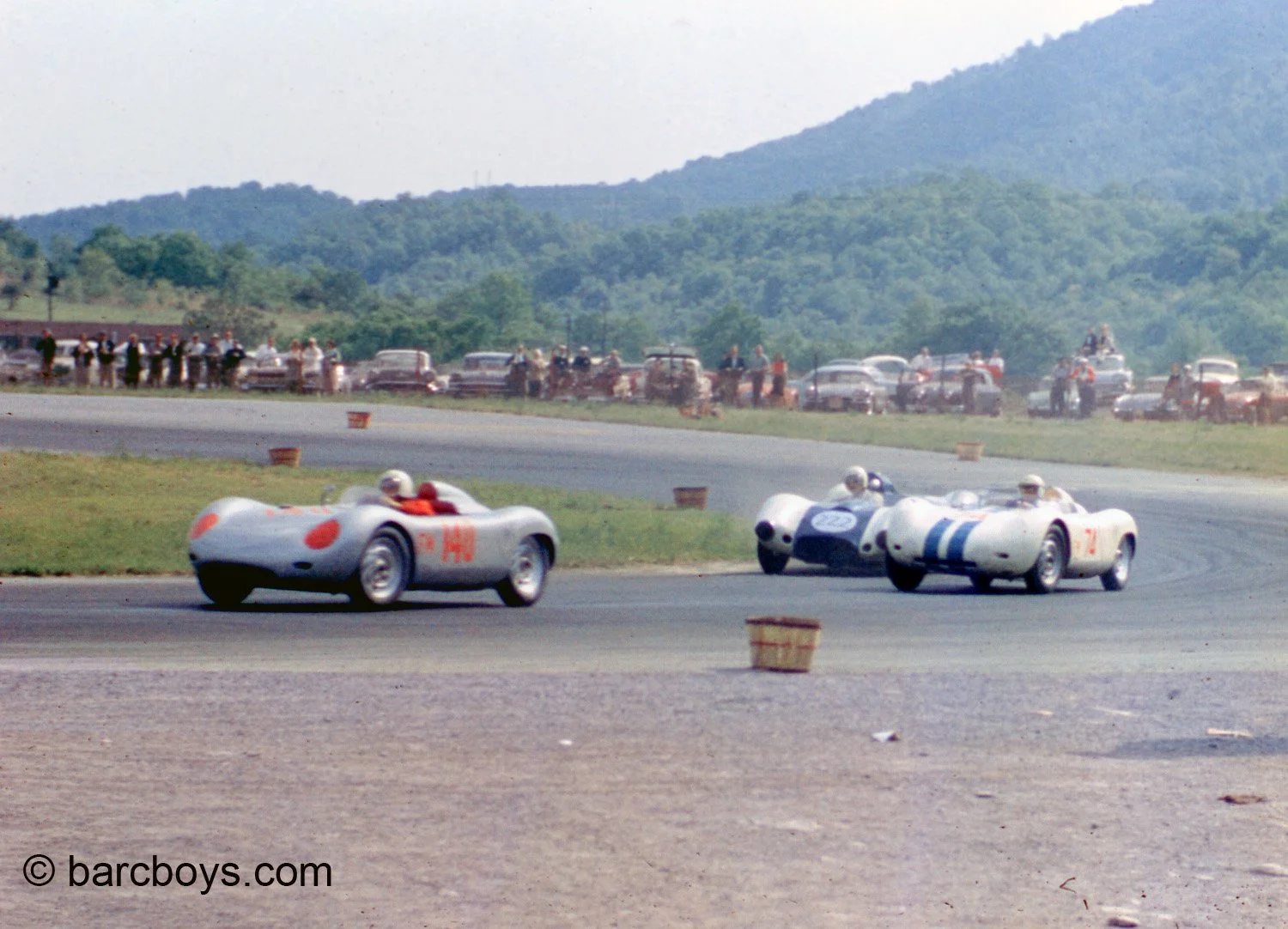  Bob Holbert in a fight with Don Sessler’s Porsche RSK and the big engined Sadler special.  Holbert and Sessler co-drove Sessler’s car to 4th overall at Sebring.  Holbert’s #140 RSK was brand new. 