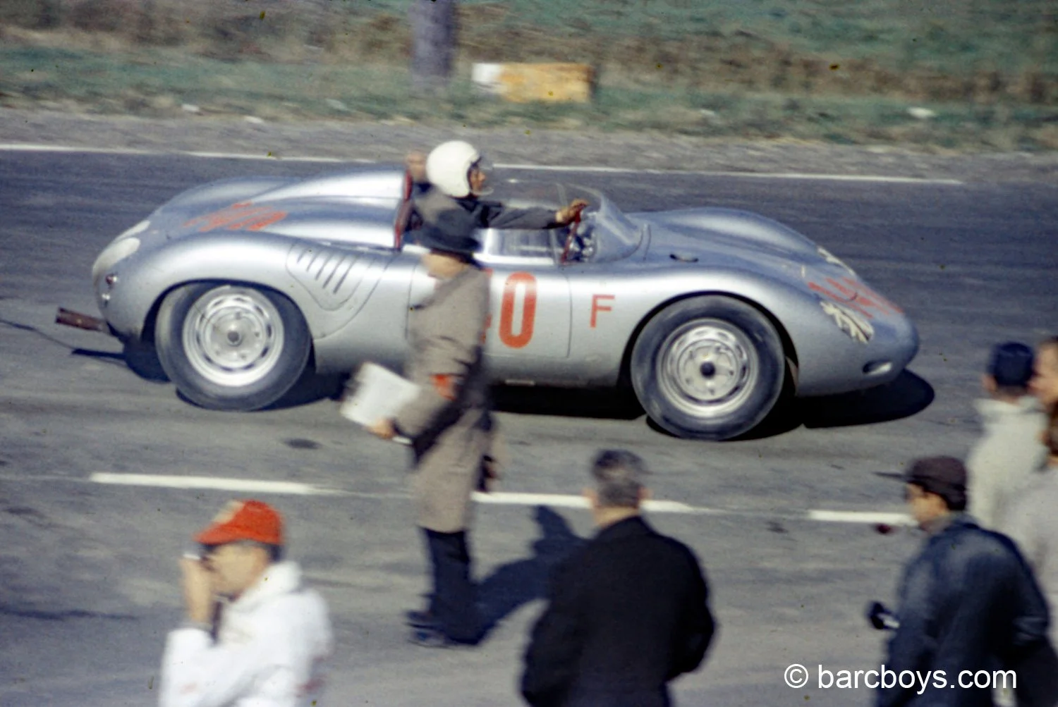  Bob Holbert rolls to the starting grid.  Holbert used the #140 at both the sportscar grand prix and the Formula Libre race.  This was not his year and he could do no better than 3rd Porsche at the Grand Prix and DNF at the Libre. 