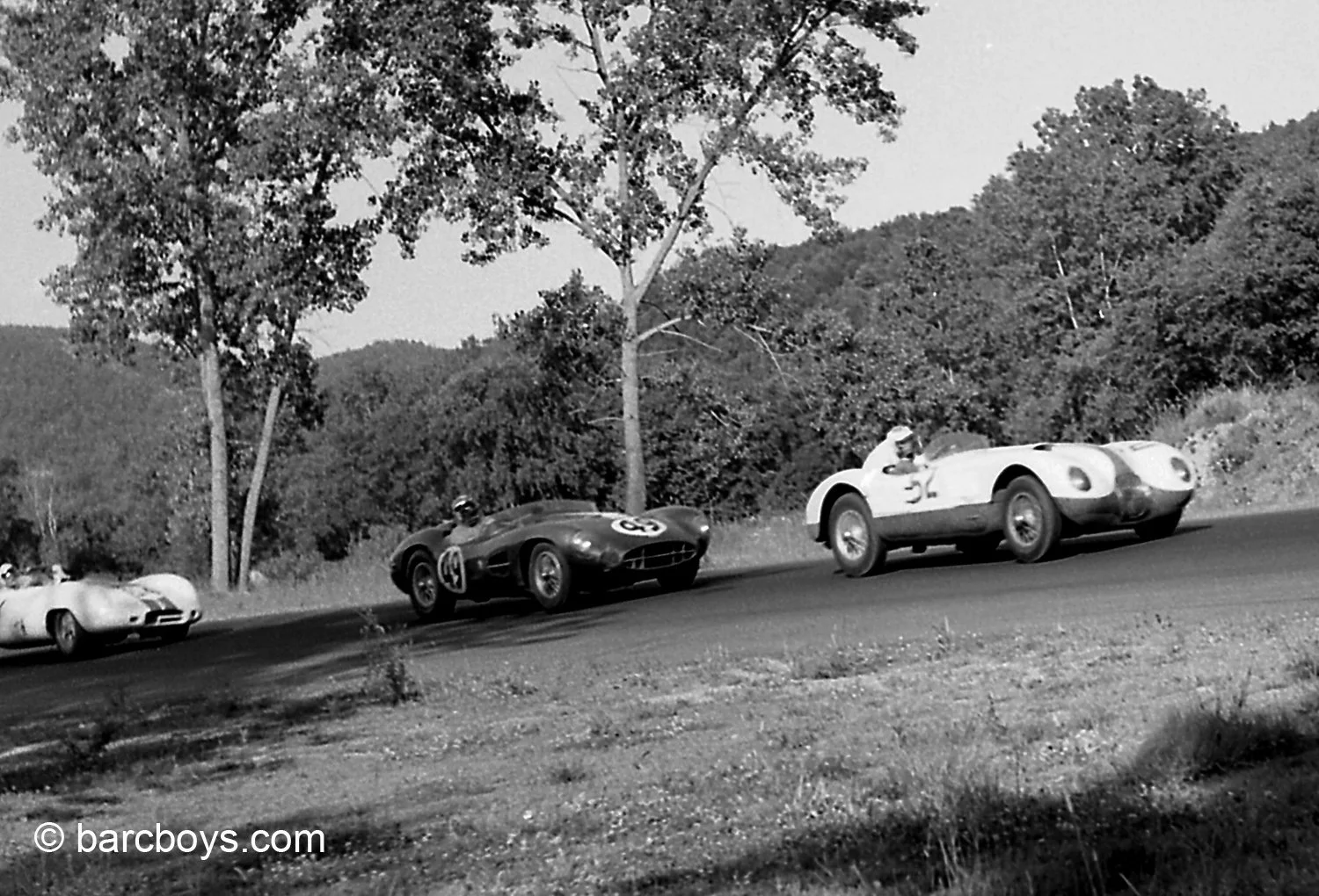  Now Constantine leads and is lapping Gordon MacKenzie in his older C Jag.  MacKenzie would race this car for many years to come. 