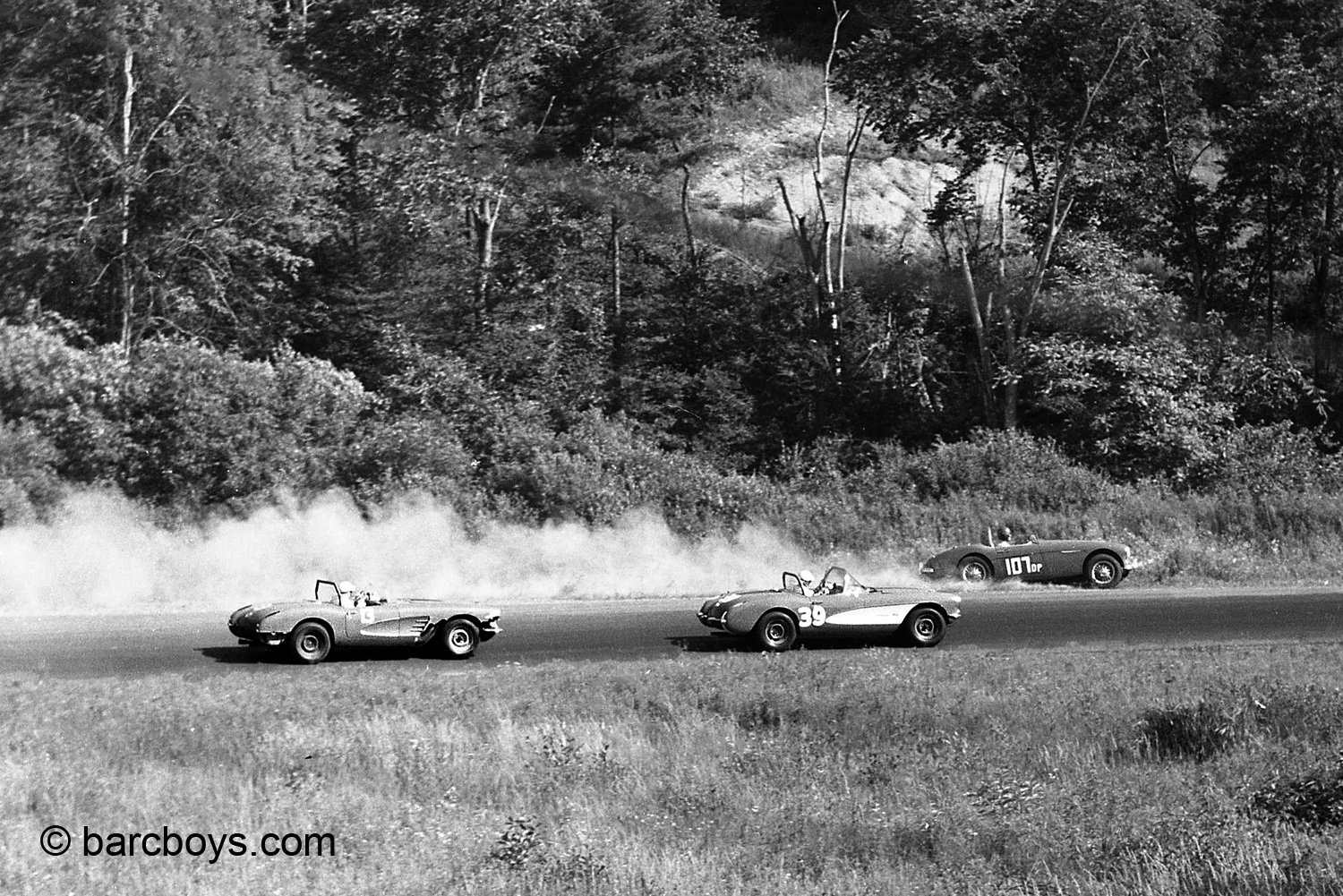  Tom Cullen’s Healey goes sliding off the road in front of Dick Jalbert and Frank Dominianni in Corvettes.  Cullen would recover and Jalbert and Dominianni would finish 3rd and 4th  
