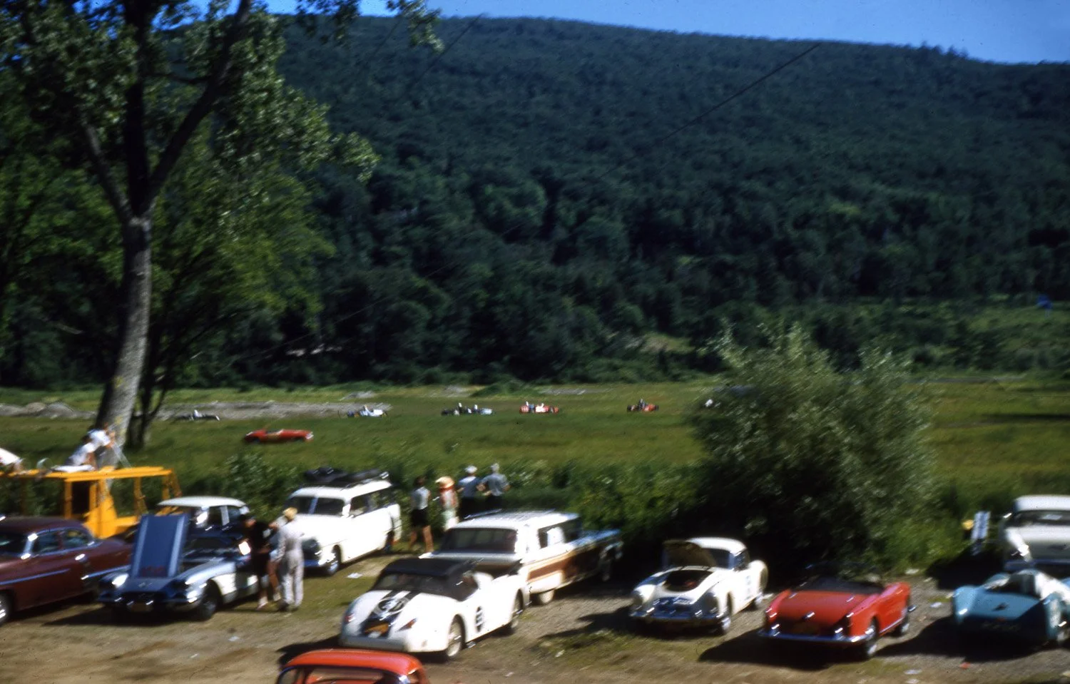  color photo by Bob Kahmer.  A little blurry but a perfect moment showing Lime Rock at her best back in the day.  This is the start of the FIII race and you can see Sherm Decker’s twincam MG still sitting in the grass where it expired. 