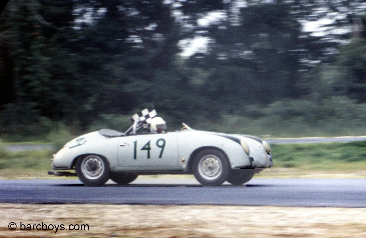  Harry Blanchard is his Porsche 356 4 cam Carrera on his checker flag lap..  Harry was an early Porsche dealer and worked his way up to competing in the USGP at Sebring.  Harry was in Buenos Aires for the 1000k race and was tragically killed less tha
