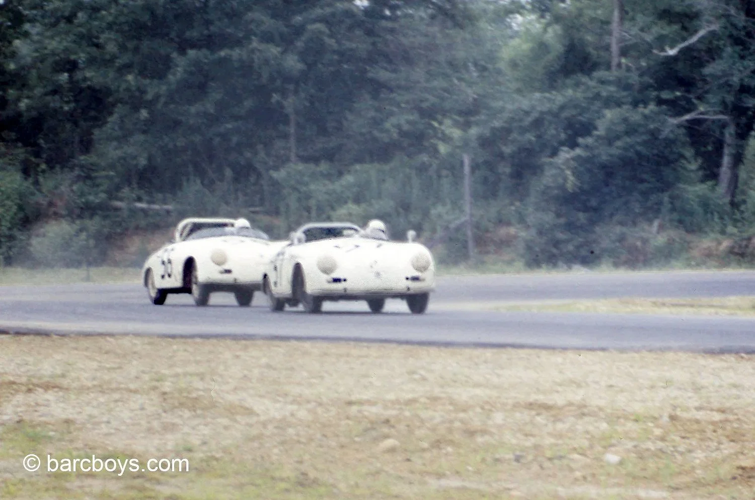  Two Porsches fight it out.  Good friends  E. E. Hobbs #56, did well finishing 2nd behind Bruce Jennings 