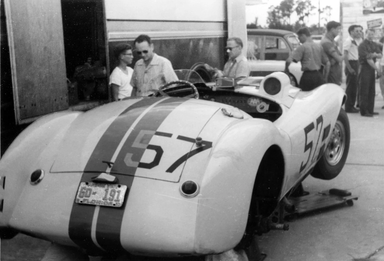  1953 winner is the #57 Cunningham C4R driven by Phil Walters and John Fitch.  Note the Florida license plate and Phil Walters with his aviator sunglasses looking over the work. 