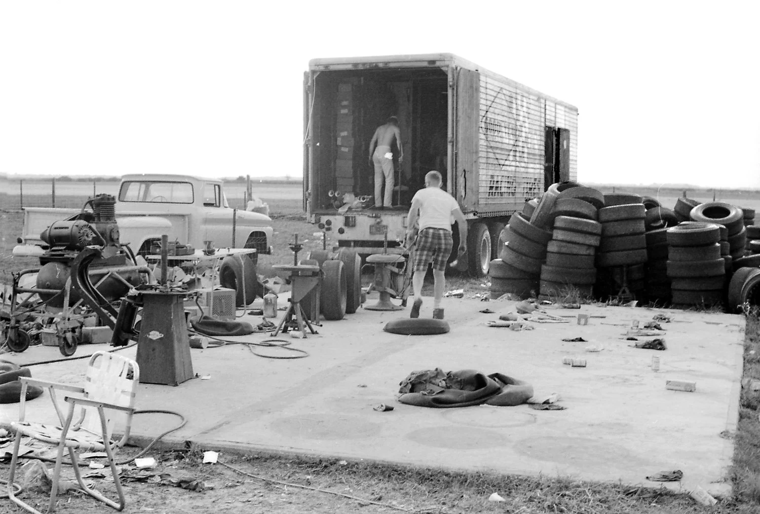  1965: From the start, some of the hardest working people at Sebring were the tire guys.  Behind the scenes with the Goodyear Truck.  This year heat and torrential rain never stopped them. 