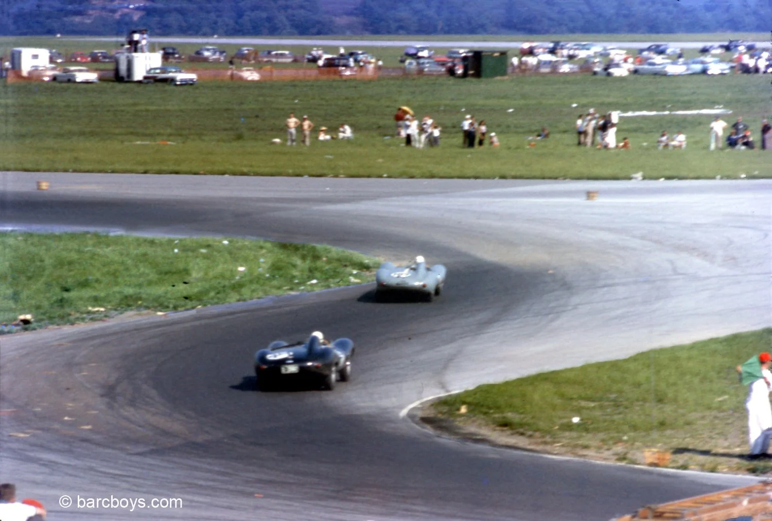  This is clearly George Constantine in the black D Type chasing a blue D type.  The problem is no other D Type is listed in the entry or results.  From the color it looks as if it is the D Type Constantine won the Glen GP in 1956 which was XKD 545. 