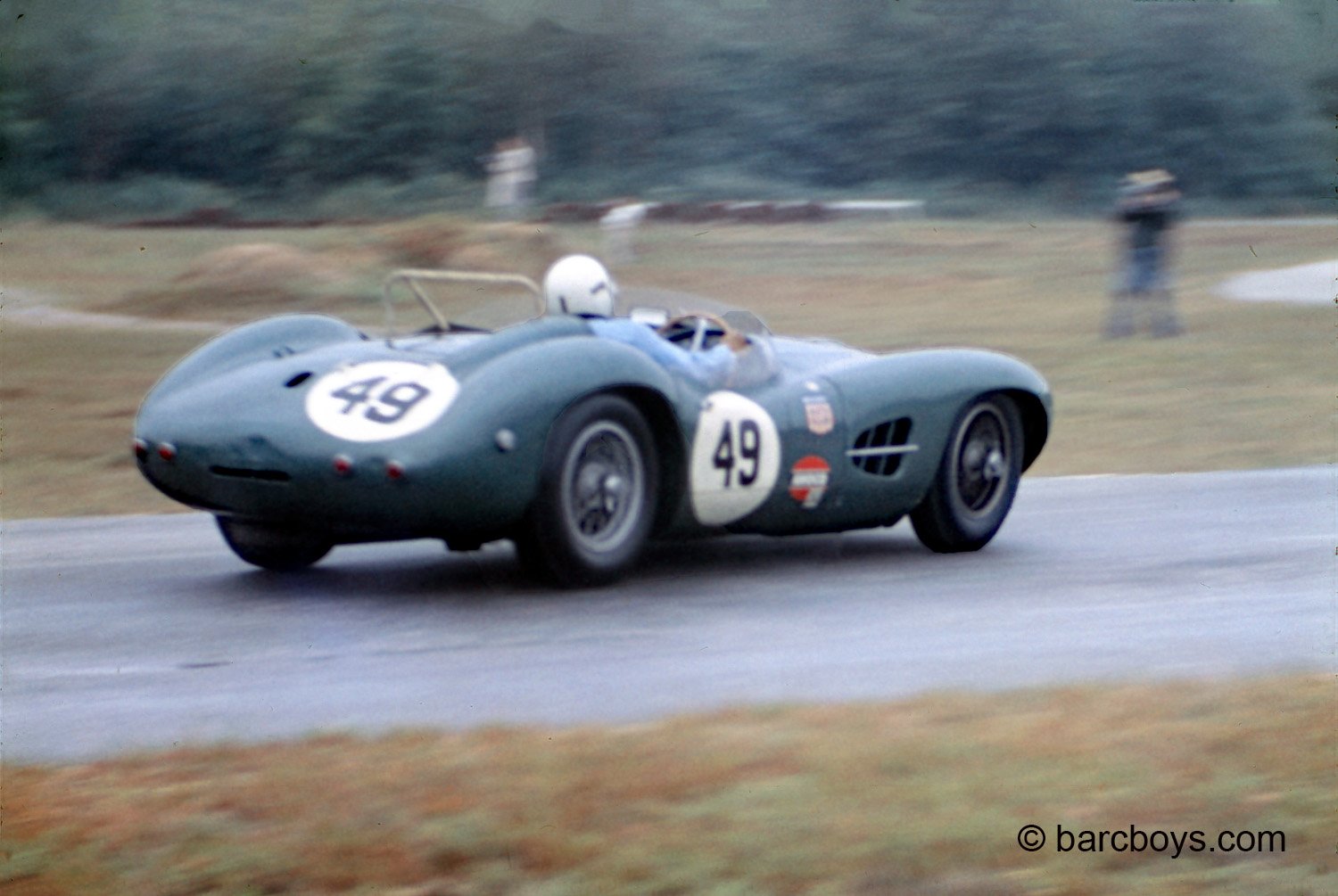  The Elisha Walker owned Aston was the same car Moss drove to victory at Goodwood and Outlon Park but now with the huge 4.9 liter motor. 