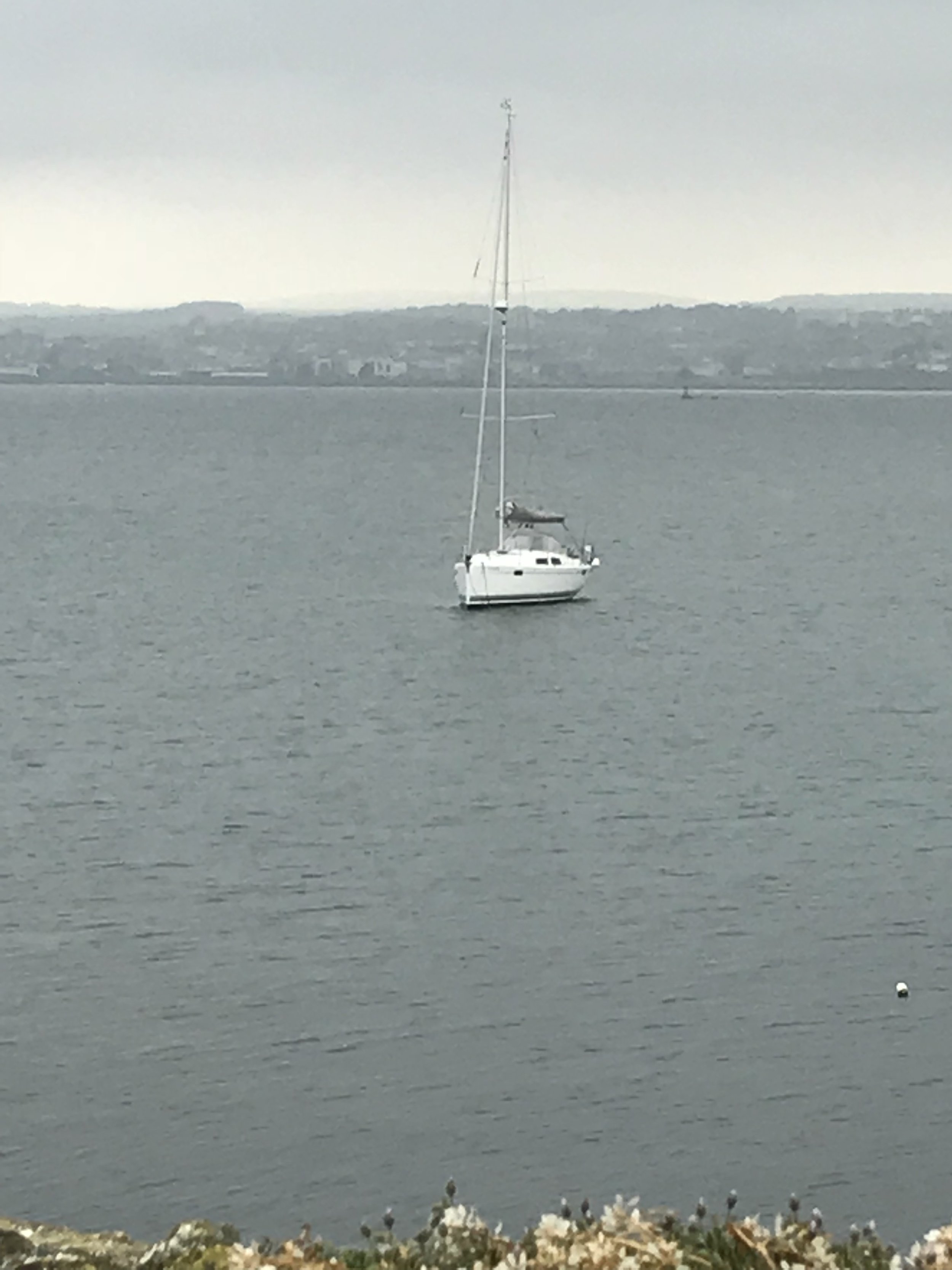 Mr Blue Sky waiting patiently at anchor