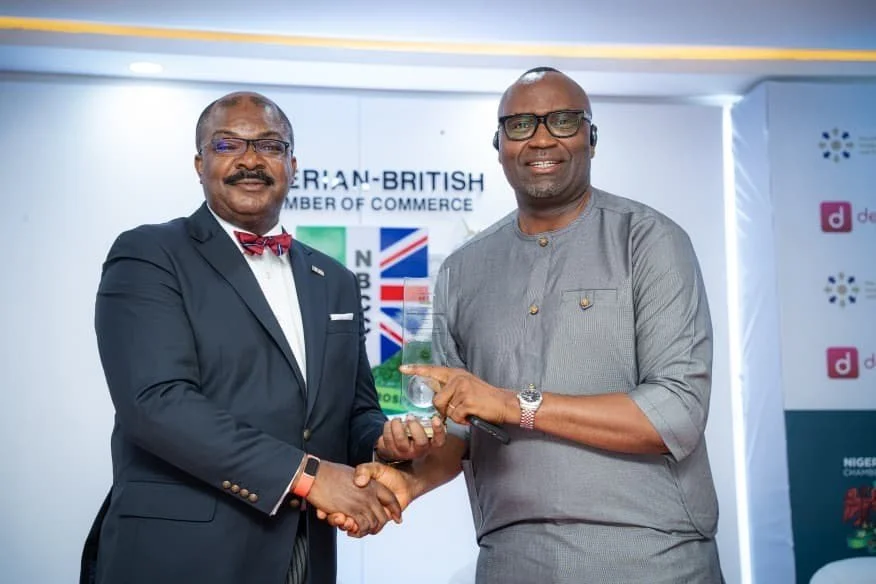 Mantra's Vice President, Operations & New Ventures, receives a sponsorship plaque from the Deputy President & Chairman of the Nigerian-British Chamber of Commerce, Mr. Akin Osuntoki.
