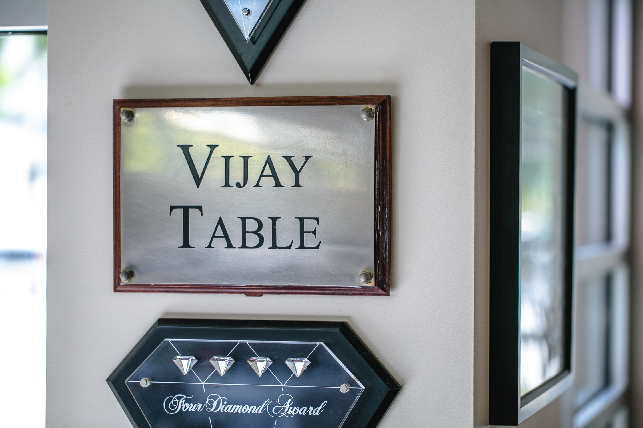 Nan-Thai-Fine-Dining-Vijay-Singh-Table-Sign-Erik-Meadows