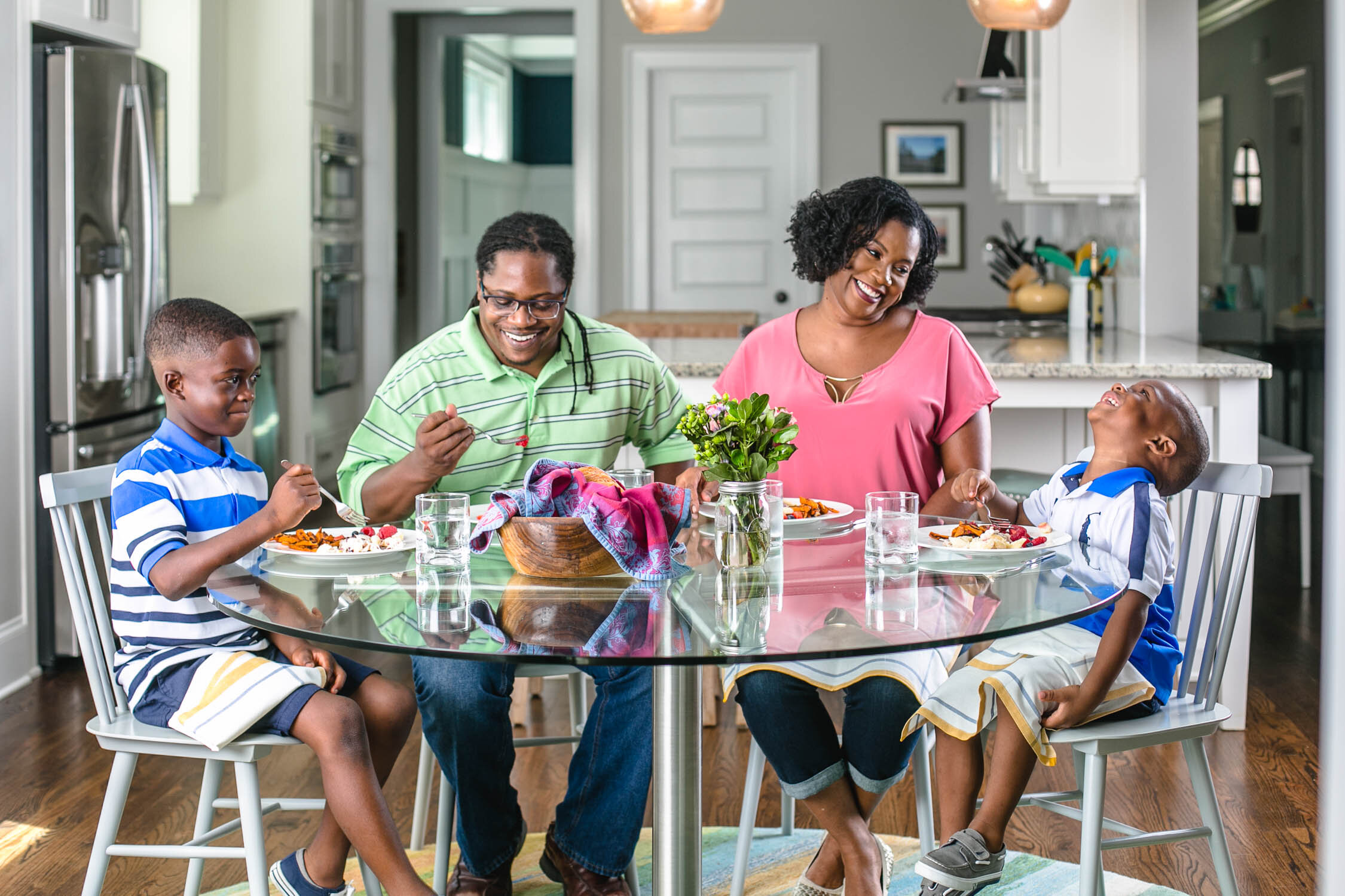 African-American-Family-eats-at-Kitchen-Table-Erik-Meadows