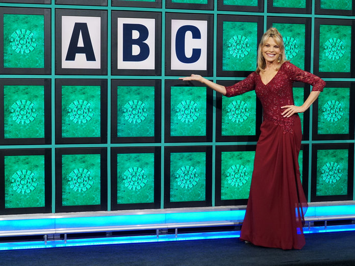 (Vanna White on Wheel of Fortune)