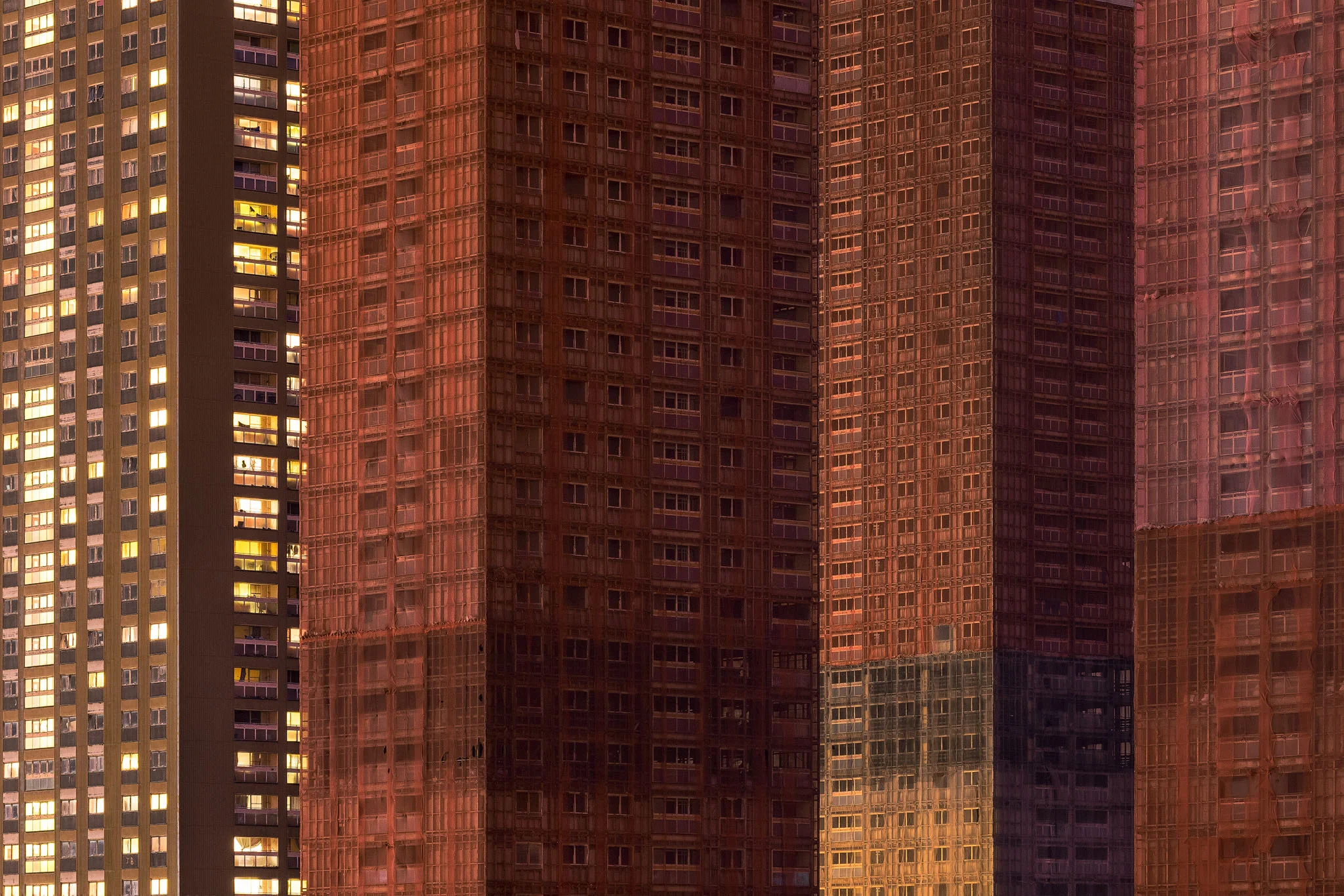 The yellow block was used to house asylum seekers from around the world while the other towers were prepared for demolition.