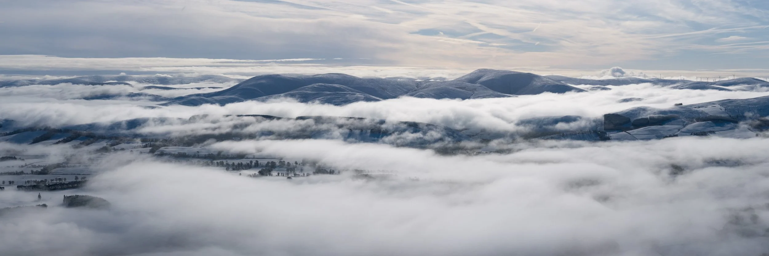 Culter Fell protruding from early morning mist.