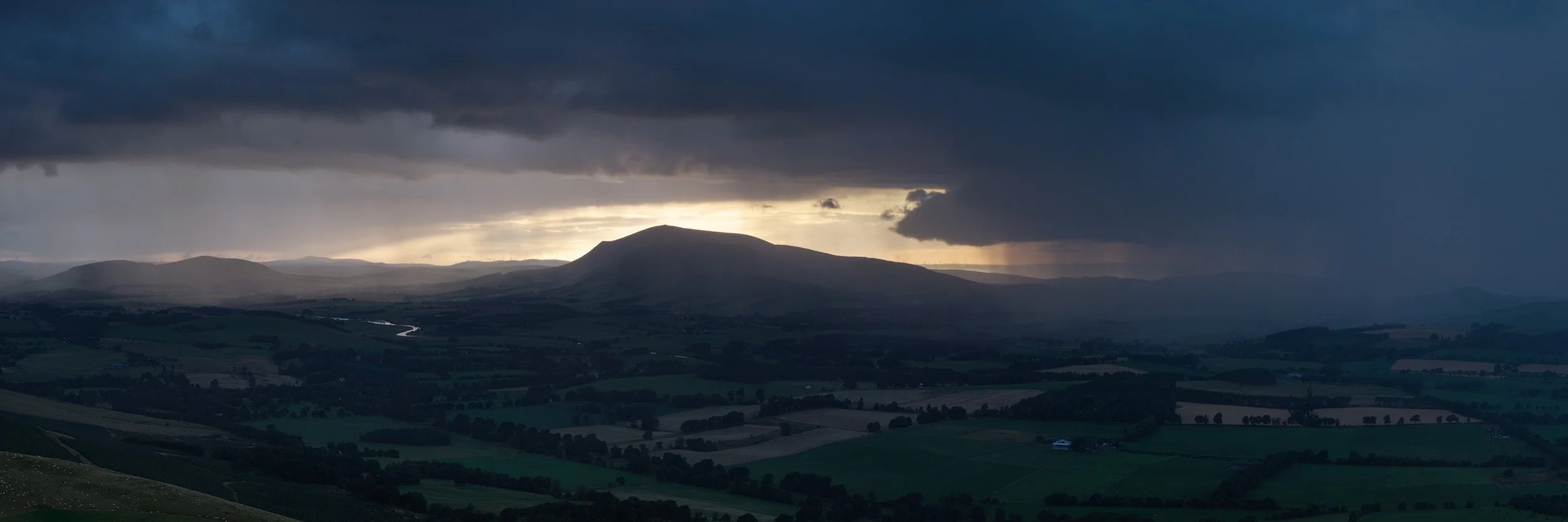  Heavy rain sweeping across the Clyde Valley at sunset. 