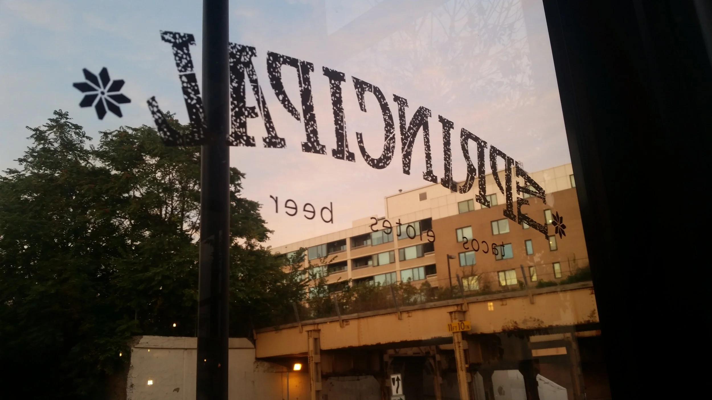 The signage for the windows was painted using vinyl templates.