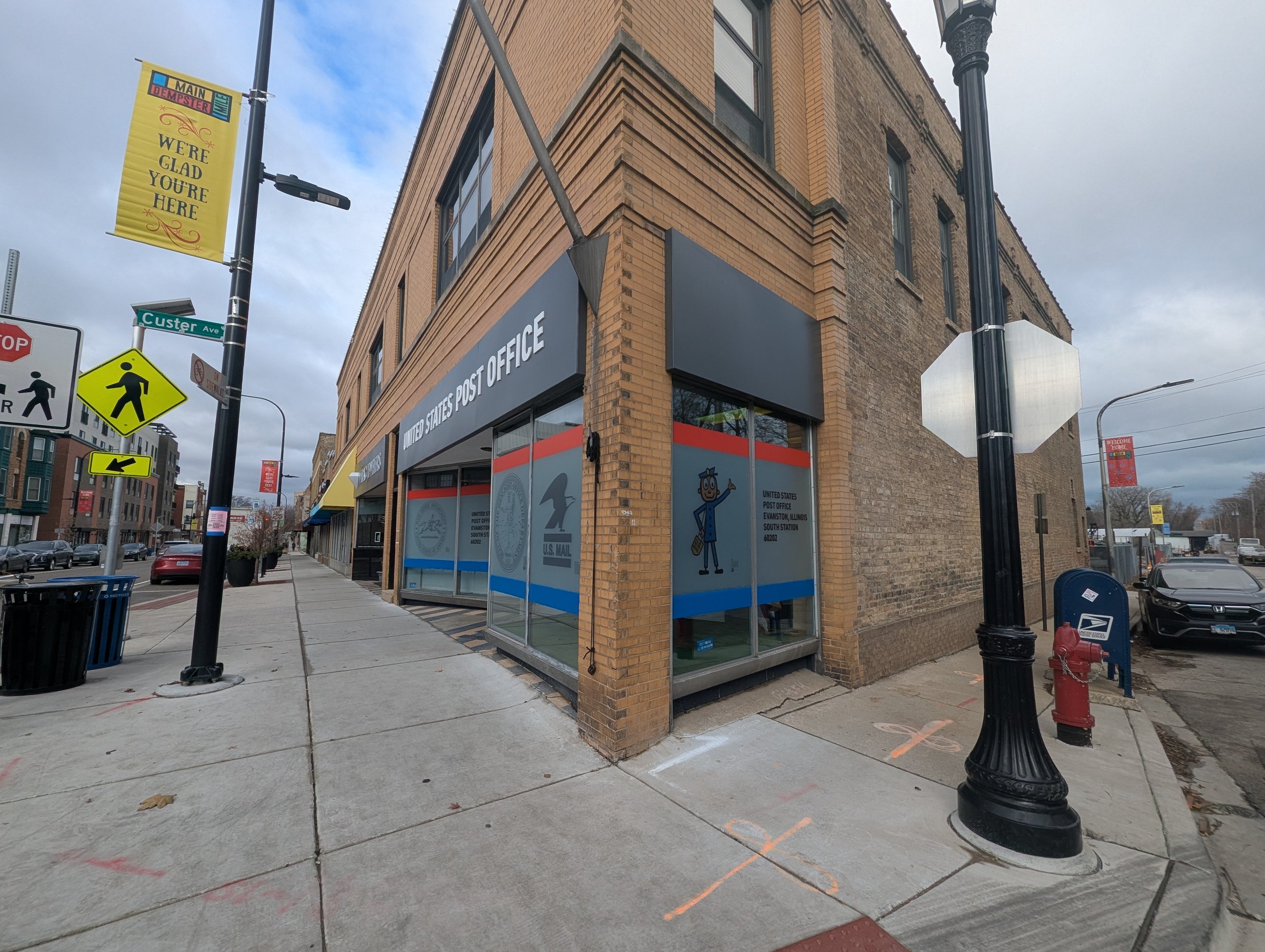  All elegant and business on the front facade,  I included 1963 mascot Mr. Zip  on the east, to greet those walking west on Main Street.    He's my wink to the neighbors. 