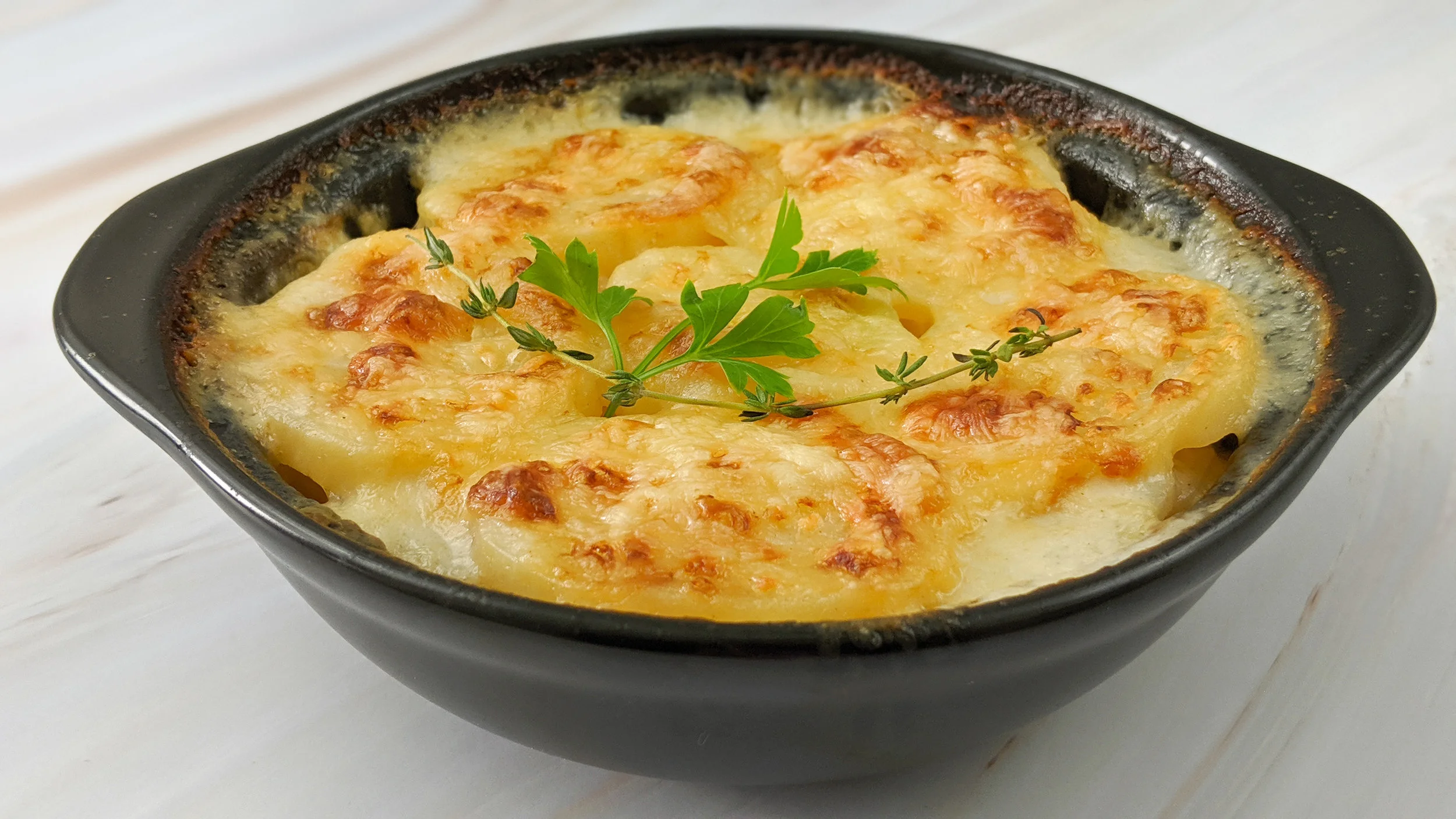 Popotoes Au Gratin