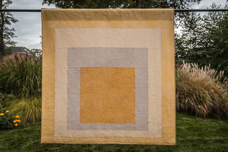 “Yellow Square” made with Cherrywood fabrics, wool batting, and finished with matchstick quilting.