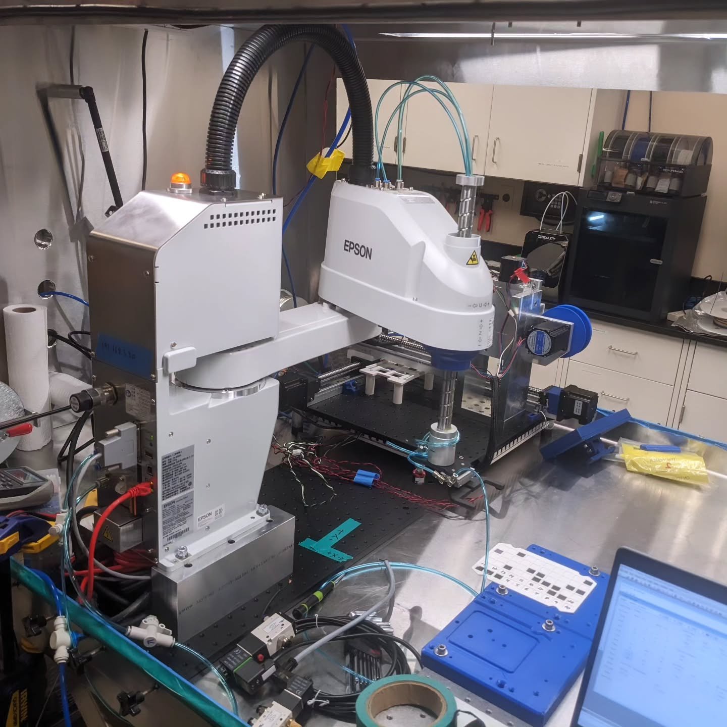 It has been awhile. We have been hard at work building and testing robots for the 2D-QMaPs of the MonArk NSF Quantum Foundry.  Yesterday our SCARA arm from Epson arrived, which will be responsible for transferring sample trays to and from our custom 