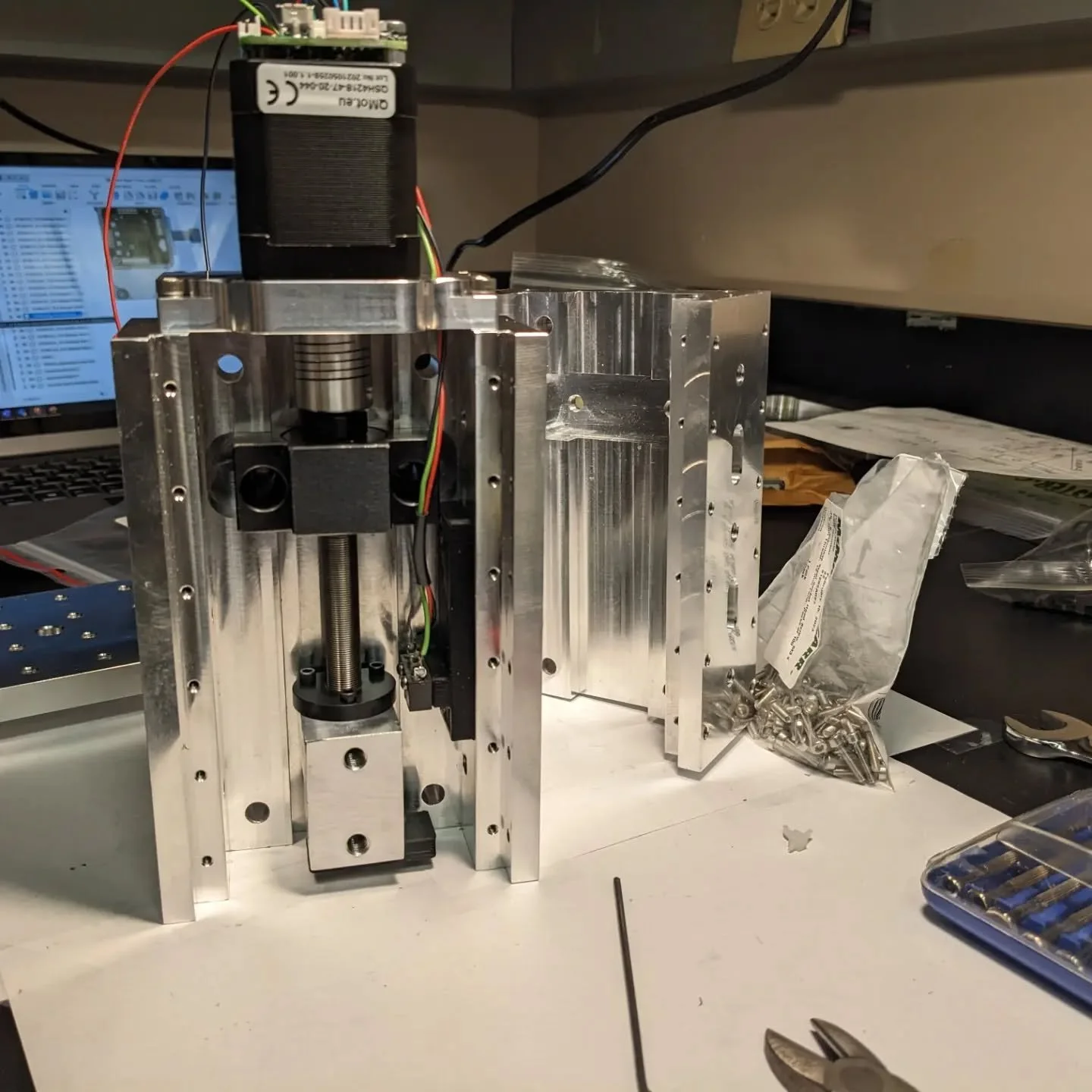 This week, we are pushing to make the first prototypes of several robotic components that will make up the 2D Quantum Materials Pipelines (2D-QMaPs) of the MonArk NSF Quantum Foundry. Here are a few early photos of a custom stage and Raman microscope